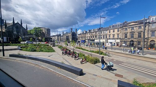 Picardy Place on a sunny day with green plants and blue skies
