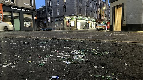 Broken glass on a pavement