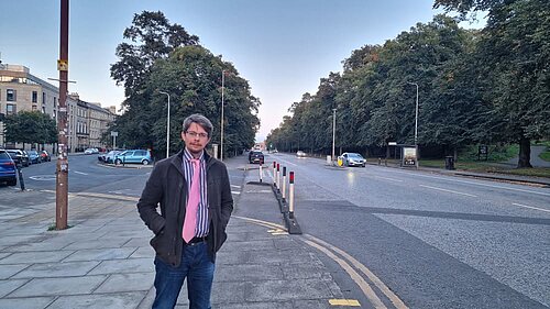 Jack standing with London Road in the background
